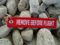 1 Schlüsselanhänger "Remove Before...